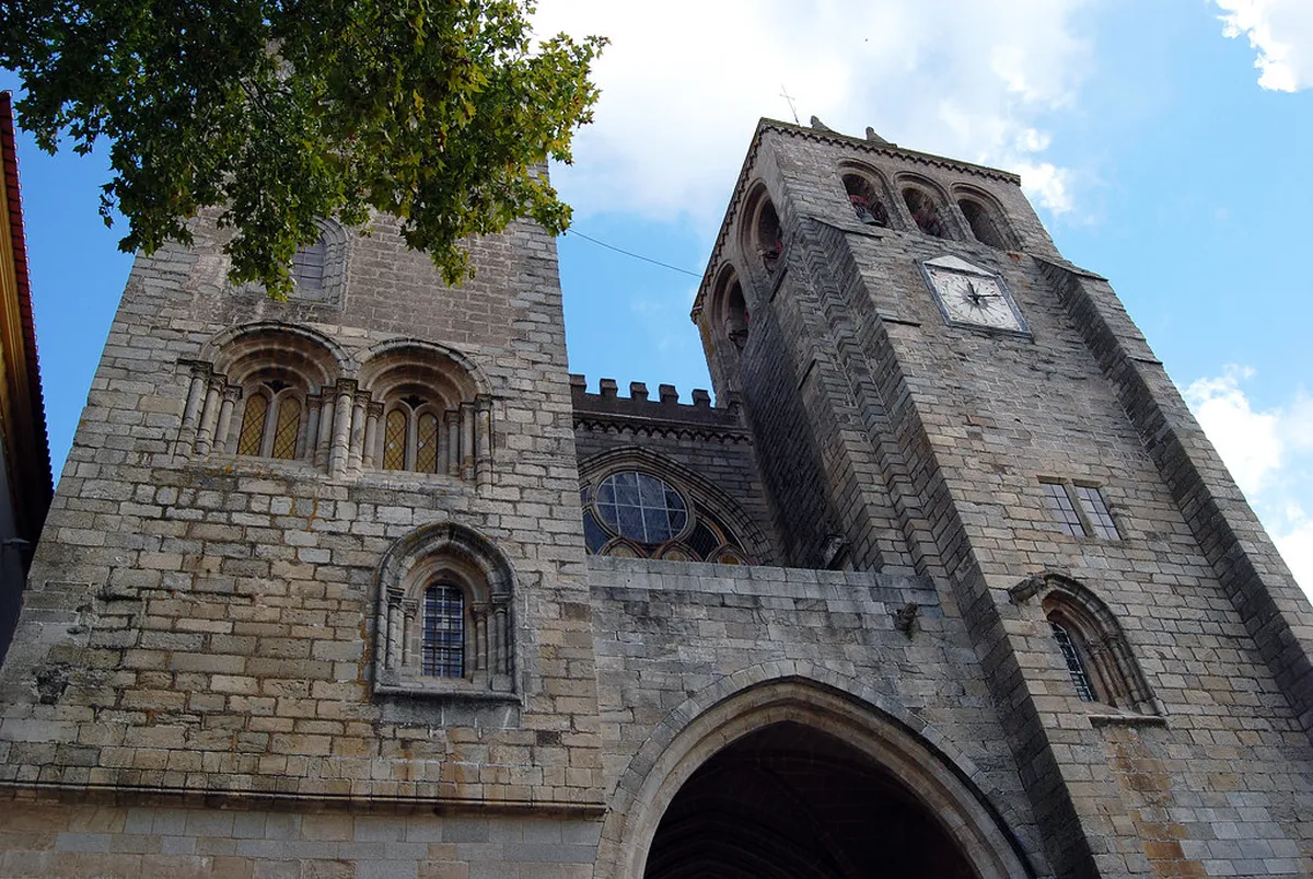 The 12th–13th century facade and twin towers of Évora Cathedral, Portugal