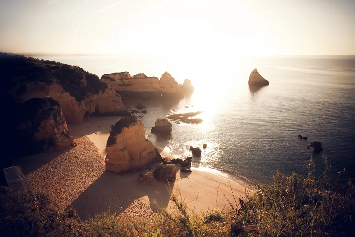 Cliff-framed cove of Praia Dona Ana near Lagos, Algarve