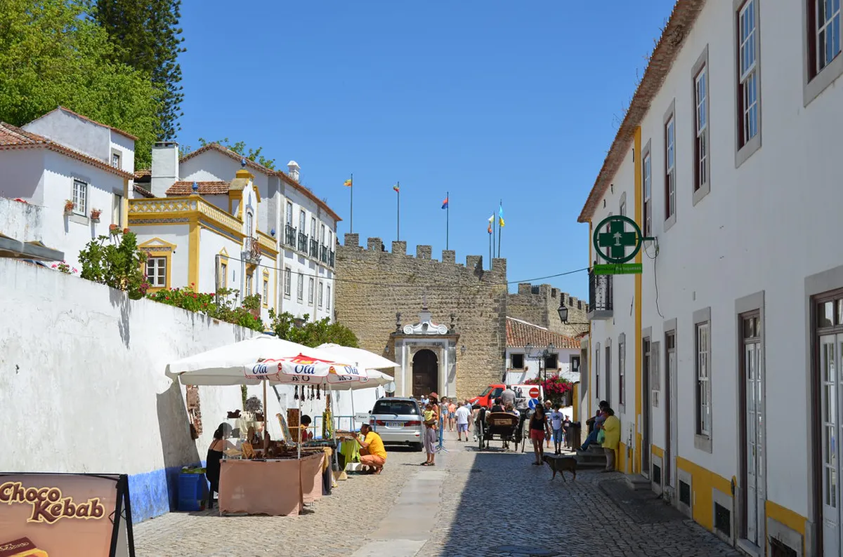 Late Morning (12:00–13:00): Bookstores, Castle, and Igreja de Santa Maria in Obidos, Portugal